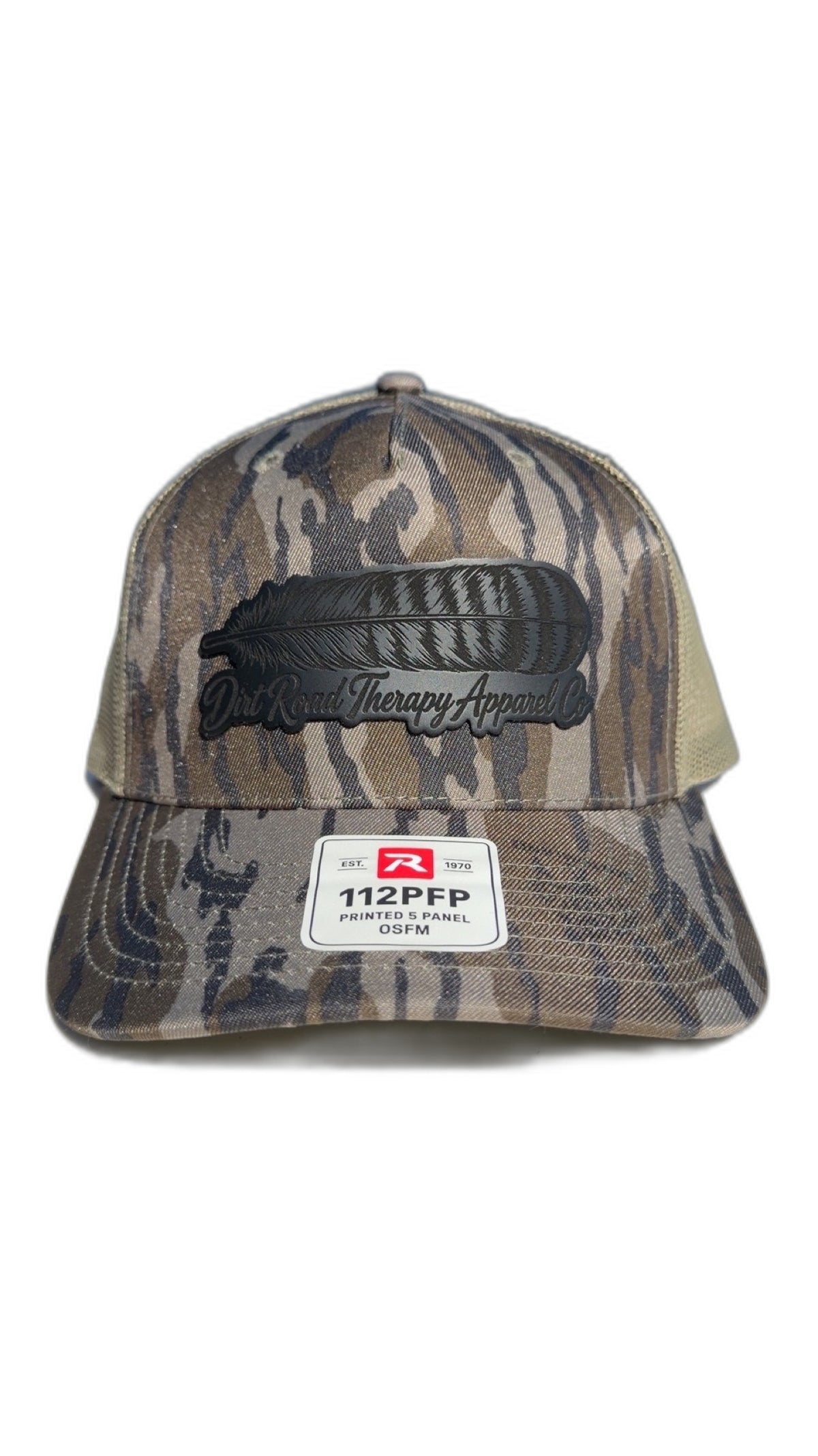 Camo Richardson 112PFP trucker hat with black leather feather patch, front view