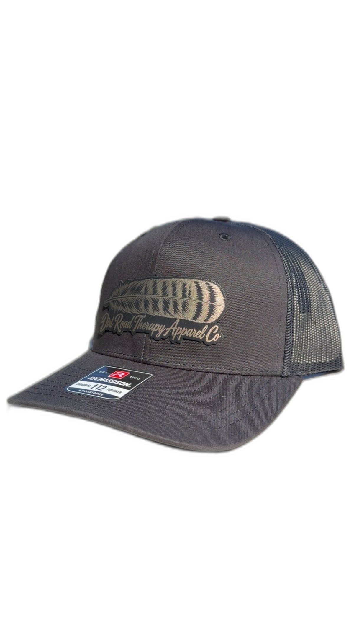 Black Richardson 112 trucker hat with gold leather feather patch