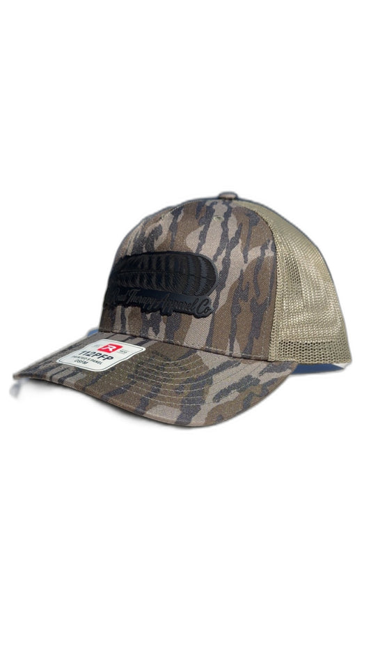 Camo Richardson 112PFP trucker hat with black leather feather patch